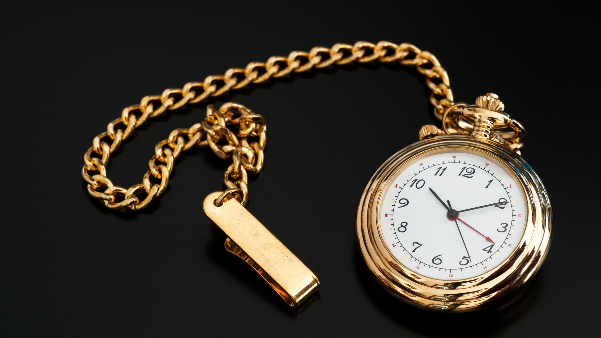 Gold pocket watch representing priority and rush drug and alcohol evaluation timelines