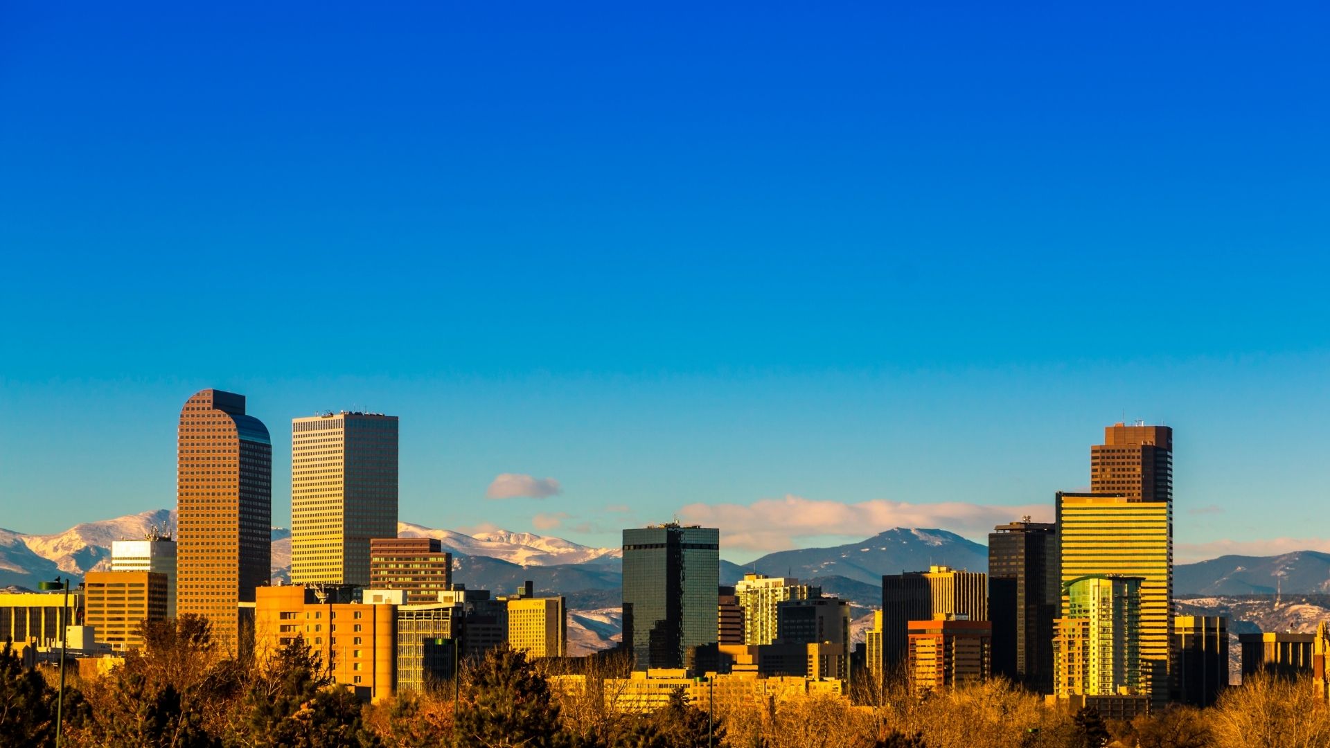 Denver Colorado skyline and Rocky Mountains for drug and alcohol evaluation services